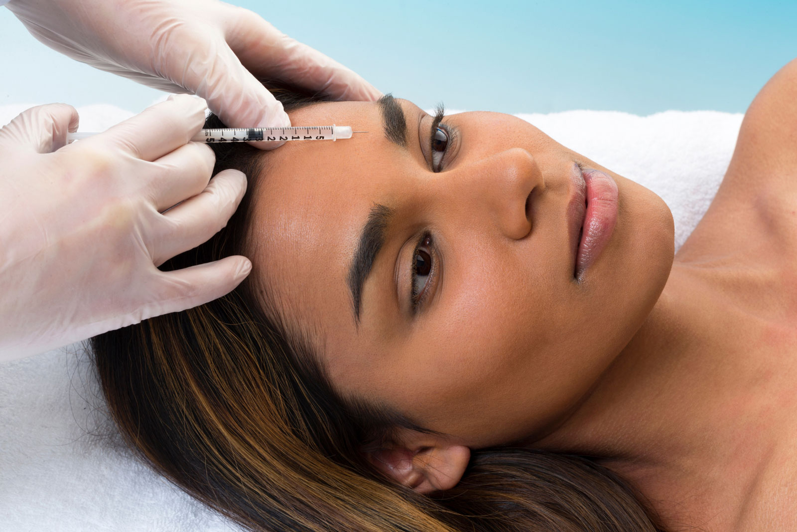 a woman receiving Botox